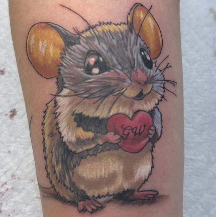 Tatouage souris Québec